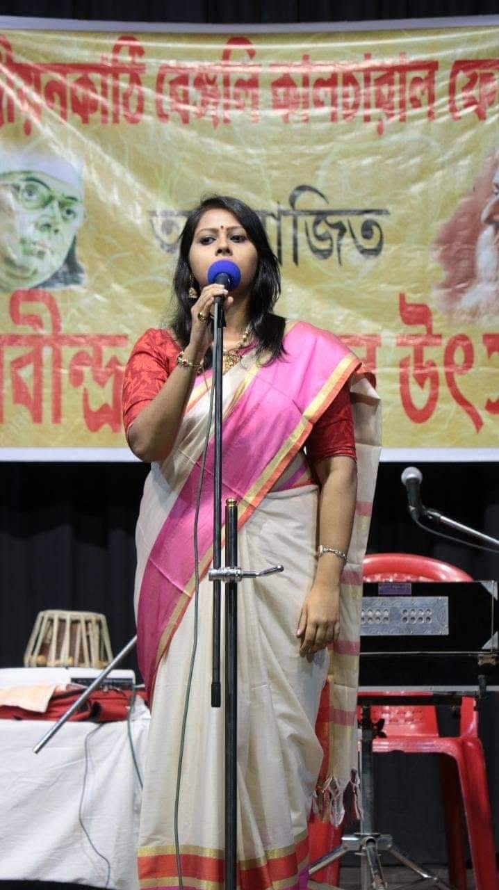 Reciting poetry into a microphone